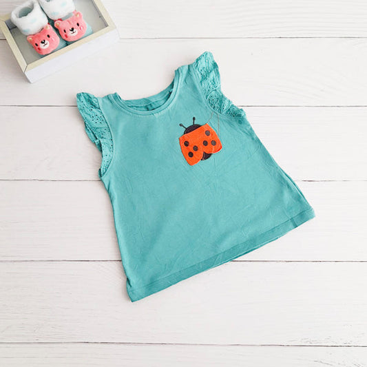 Polera Algodón Verde Marca Next baby 6-9 M Estado Casi tiki