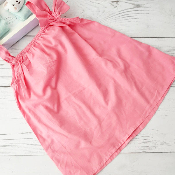 Vestido tela rosada 9 meses Marca Boulevard Estado Casi tiki
