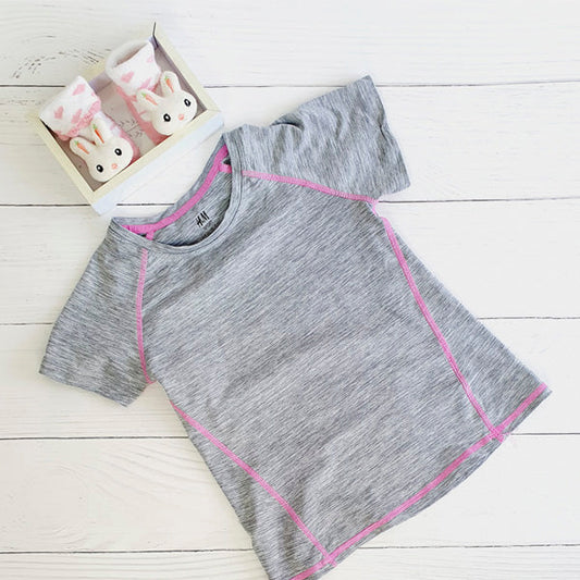 Polera Poliéster Gris Marca Hym 6 A Estado Tiki taka