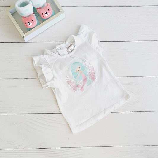 Polera Algodón Blanco Marca Baby harvest 6-9 M Estado Tiki taka