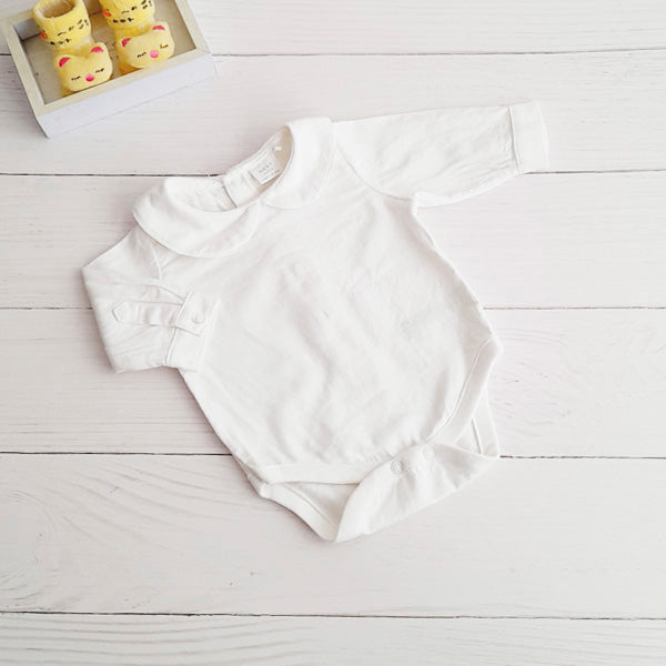 Body Algodón Blanco Marca Next baby RN Estado Tiki taka