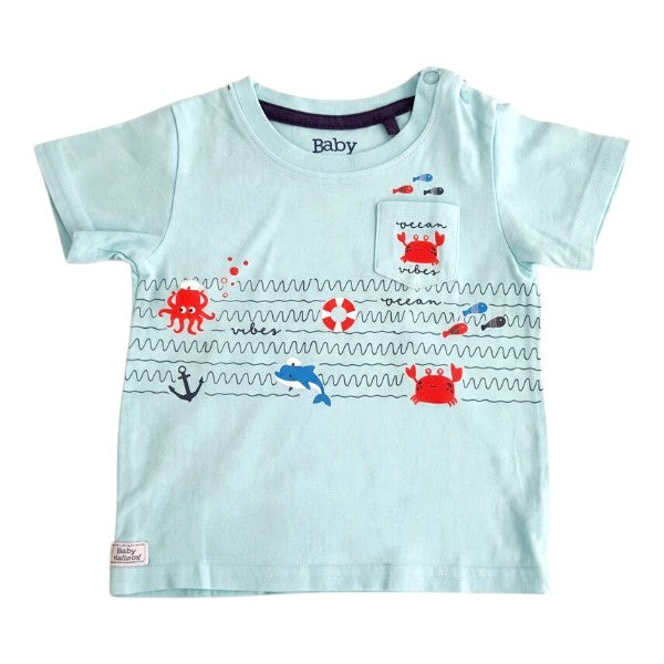 Polera manga corta Algodón Celeste Marca Baby harvest 18 M Estado Tiki taka
