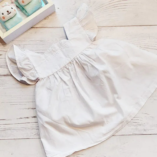 Vestido tela sin mangas color blanco 0 meses Marca Shein Estado Tiki taka