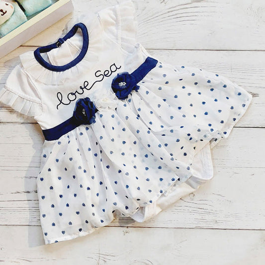 Vestido vestido de falda blanca con puntitos azules de 3 meses Marca Limonada Estado Tiki taka