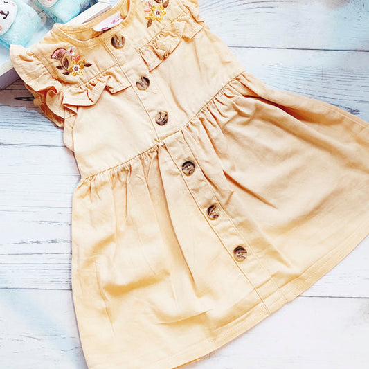 Vestido tela color damasco con botones tipo madera 12 meses Marca Little Lass Estado Tiki taka