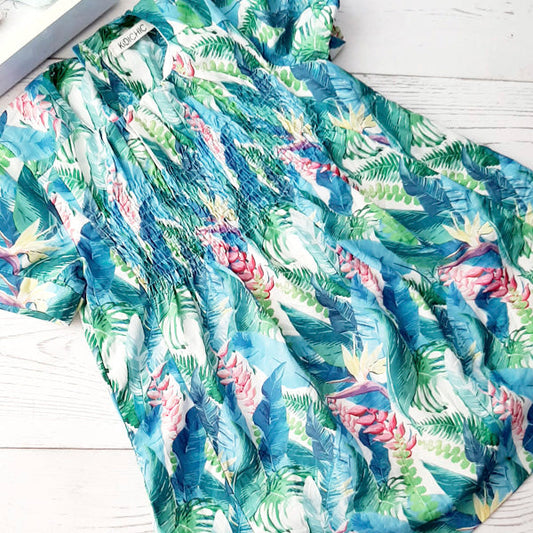 Vestido tela con hojas y flores 18 meses Marca Otra Estado Casi tiki