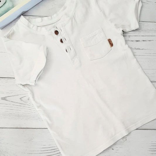 Polera algodón blanca con bolsillo talla 3 Marca Yamp! Estado Casi tiki