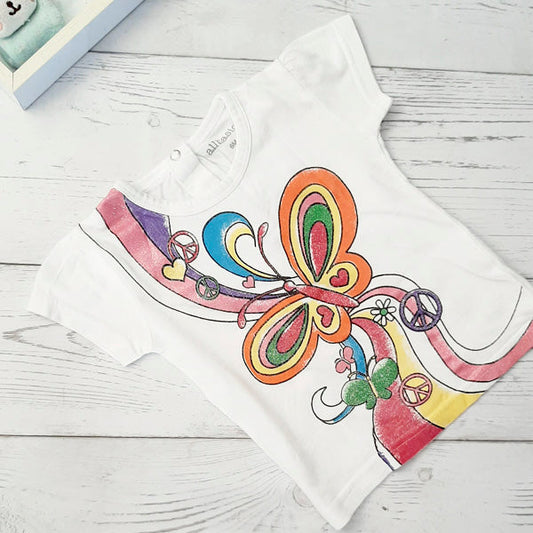 Polera algodón blanca con diseño de mariposa 6 meses Marca All basics Estado Casi tiki