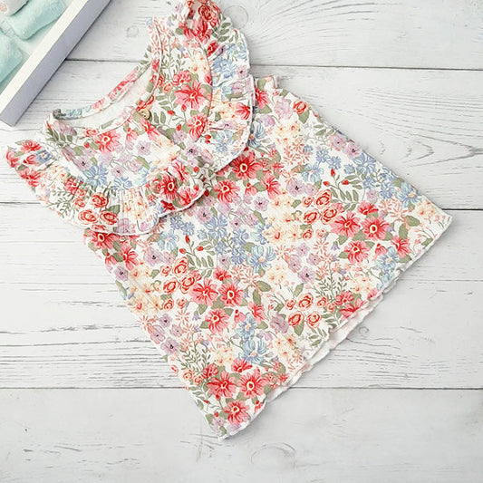 Polera algodón blanca con flores de colores 12 meses  Marca Otra Estado Tiki taka