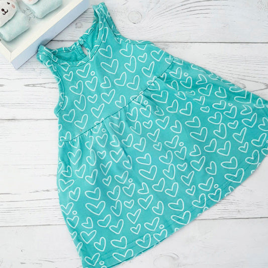 Vestido verde con corazoncitos 6-9 meses Marca Baby harvest Estado Tiki taka