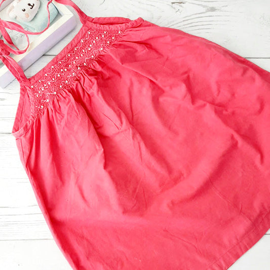 Vestido tela rosada con pelotitas 3 años Marca Baby harvest Estado Casi tiki