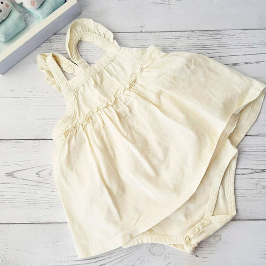 Body vestido tela amarilla 3-6 meses Marca Urb Estado Casi tiki