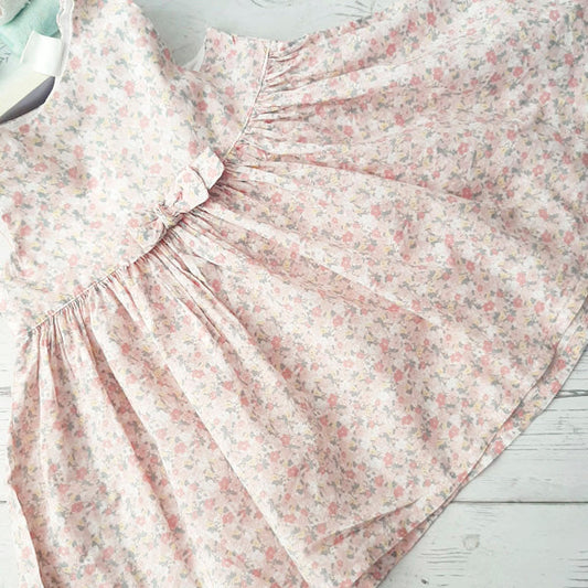 Vestido tela rosa florida 6-9 meses Marca Gymboree Estado Tiki taka